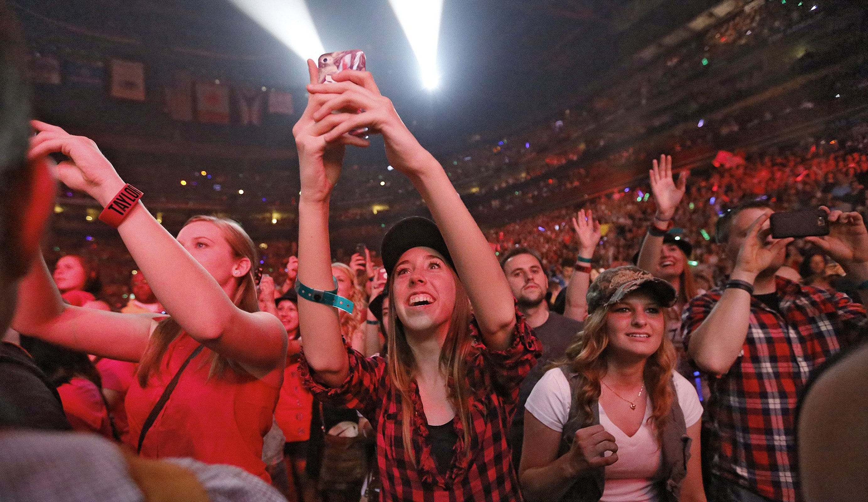 Fans react as Taylor Swift performs at Nationwide Arena during her Red Tour on Wednesday, May 8, 2013. (Columbus Dispatch photo by Jonathan Quilter)
